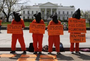 Protester campaign for the closure of Guantanamo Bay outside the White House