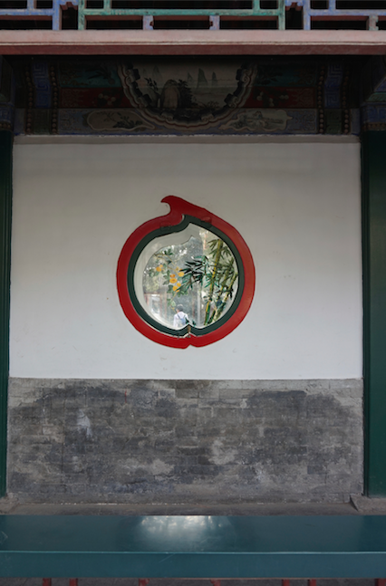 A cute fruit window in a wall in the Summer Palace, Beijing, China