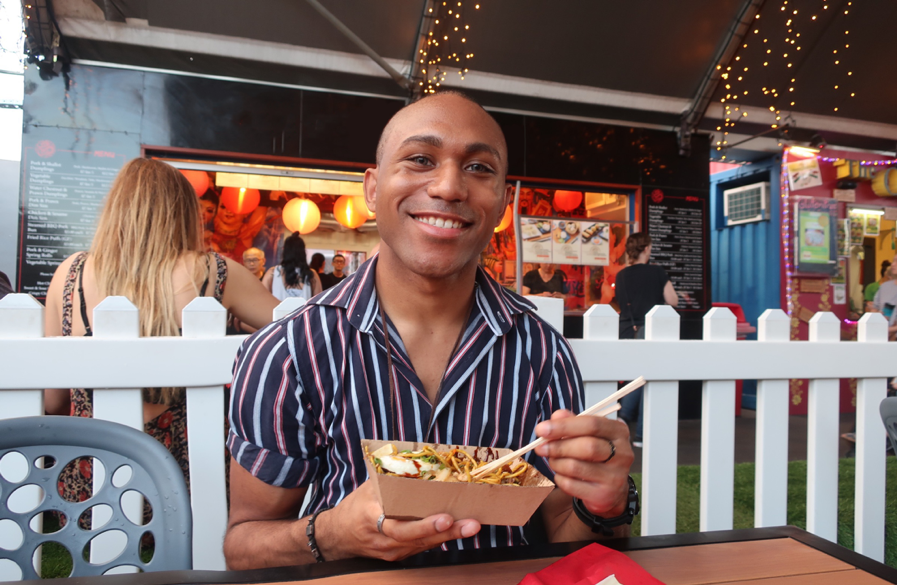 picture of an adopted man eating food