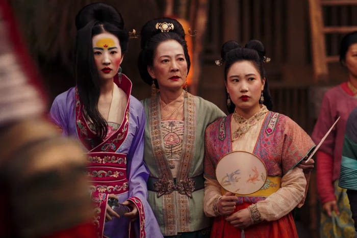 Mulan with her mother and ssiter ready for the matchmaker