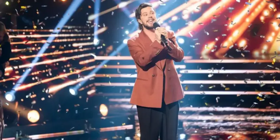 Dylan Wright, winner of Australian Idol Season 9 (2024), performs on stage amidst confetti during the grand finale.