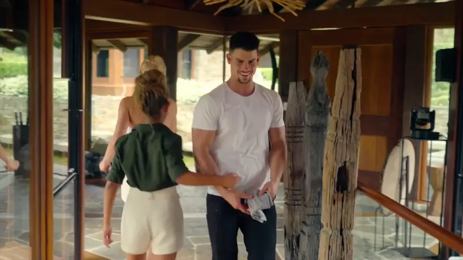 Nicole touching Matt's arm on Billion Dollar PLayground