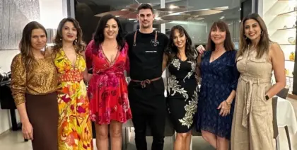 Chef matt with his clients after catering a meal
