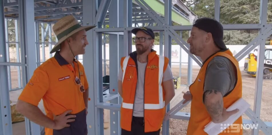 Robby and Mat asking Foreman Dan about the wine cellar.