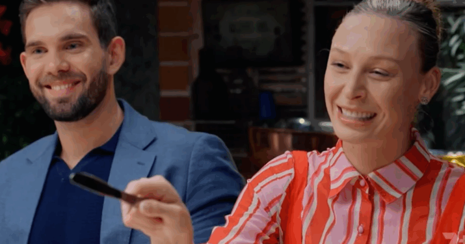 MKR's Michael and Reilli, with Reilli pointing a butter knife at Mel
