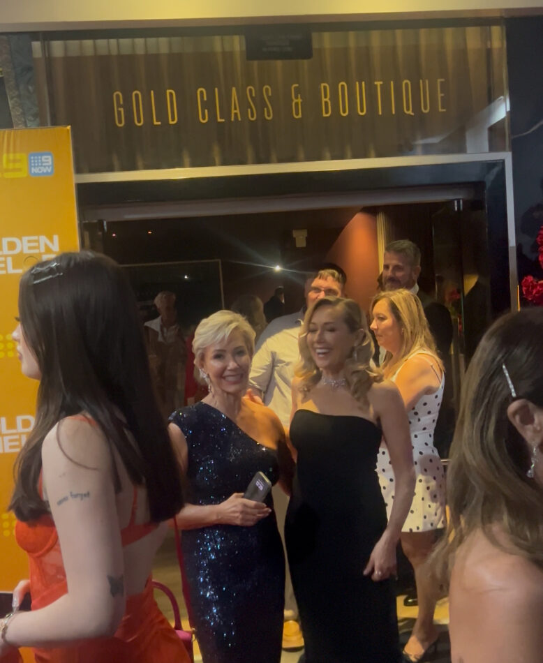 Bear looking at Jan red carpet Golden Bachelor 