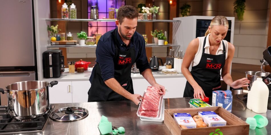 Michael picking up the tray of ribs.