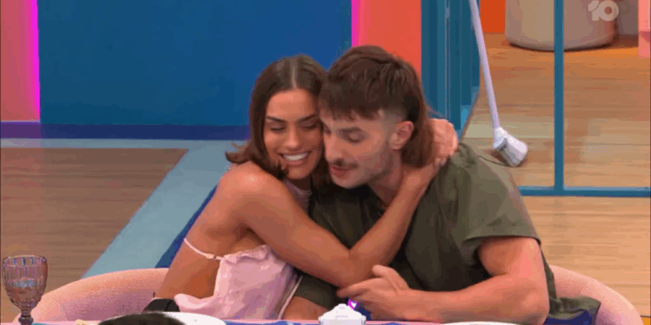 Holly and Colin cuddling in the Big Brother Australia house.