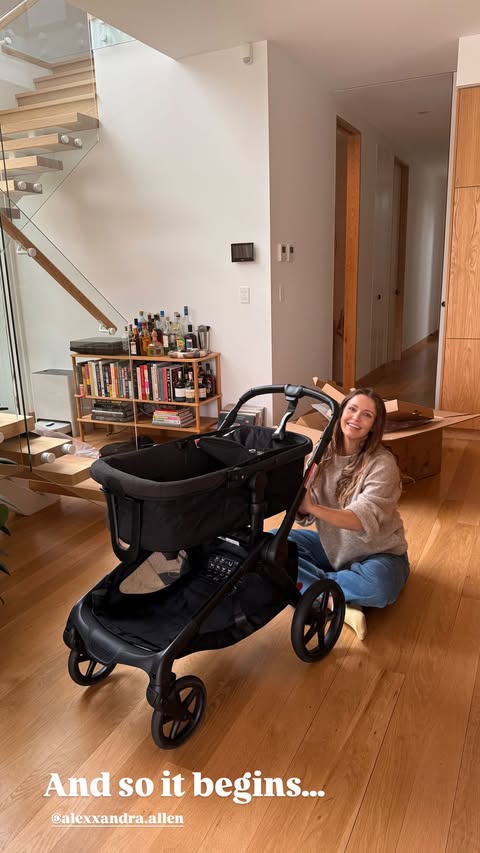 Andy Allen's wife Alex with a pram after their baby announcement