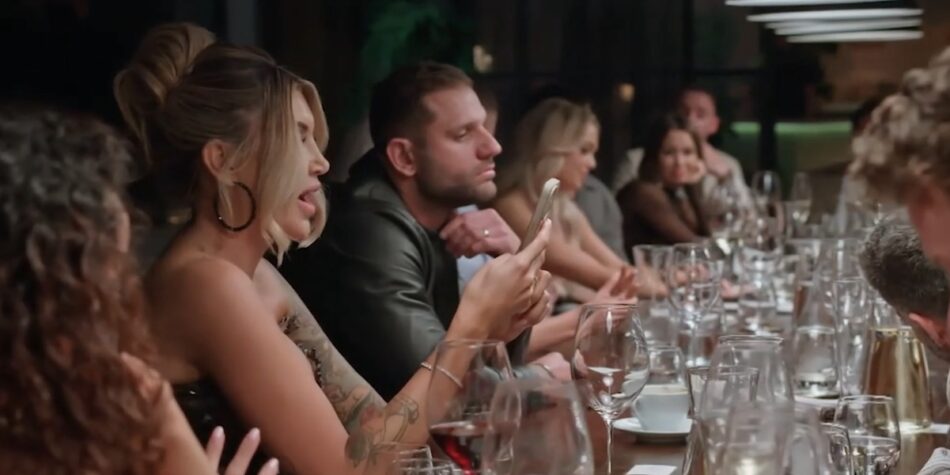 Gia reading out texts at the Dinner Party. Image: Nine.