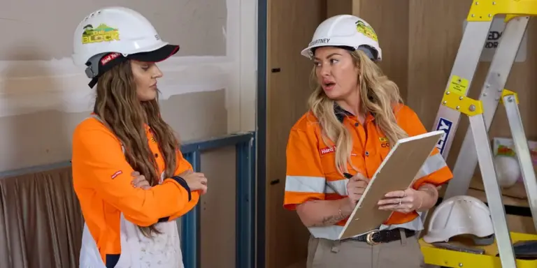 Courtney and Sev with a whiteboard on The Block