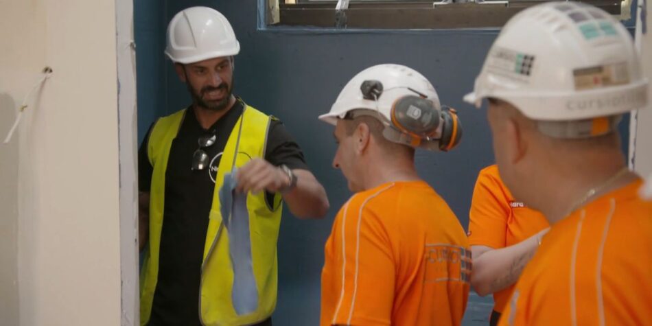 The Cursio Brothers ripping up waterproofing in Courtney and Sev's bathroom. Image: Nine.