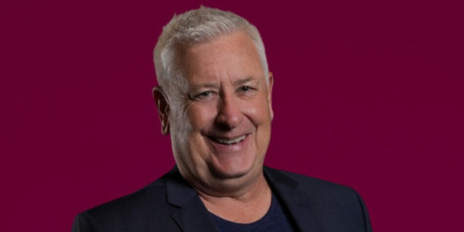 Cast photo of Ian Dicko Dickson smiling on The Traitors Australia